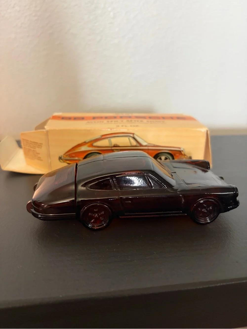 Vintage collectible Avon '68 Porsche Spicy After Shave - Orange and Cream Box